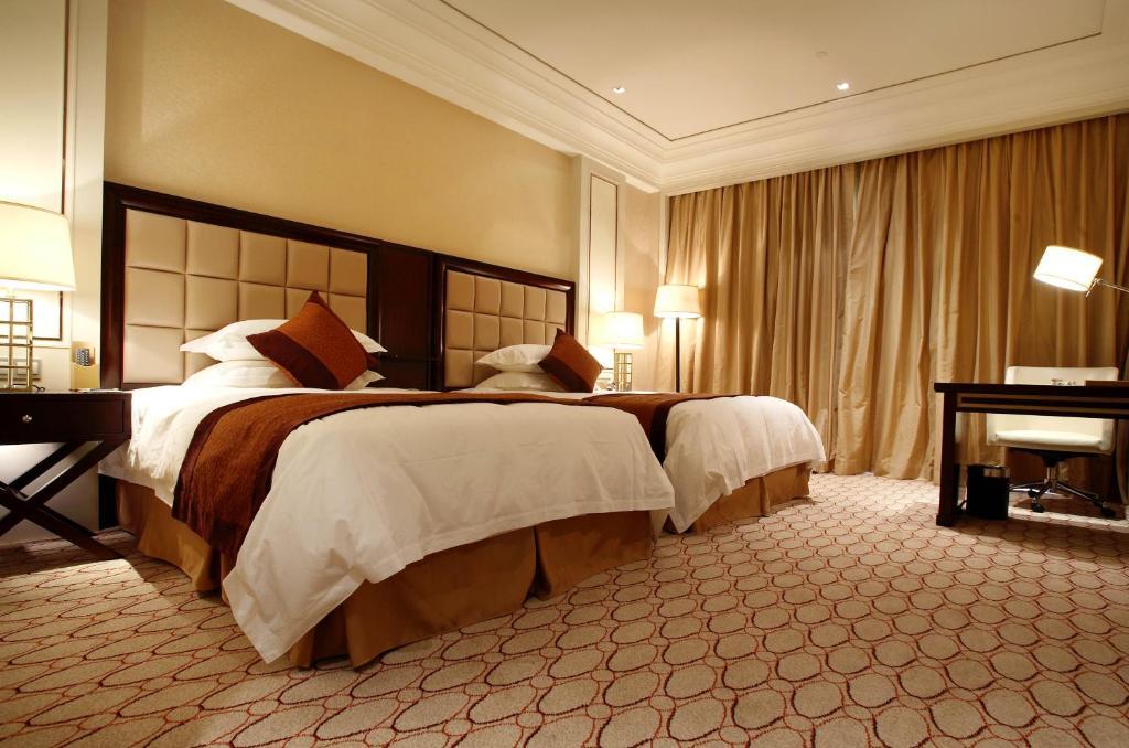 Landison Green Town Hotel Xinchang Rum bild